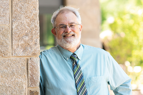 Assumption Professor Mike Land, Ph.D. 