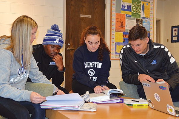 Student-athletes (FROM L TO R) Lexi Finn ’19, Stephon Hill ’19, Johnna Caporuscio ’21, and Branislav Vujadinovic ’20 studying in the d’Alzon Library.